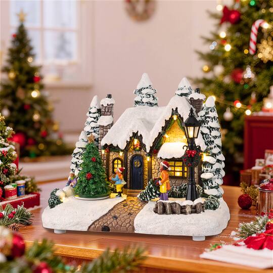 Glitzhome® 9.5" Lighted Christmas Snowy Musical Resin Village with Movement and Timer